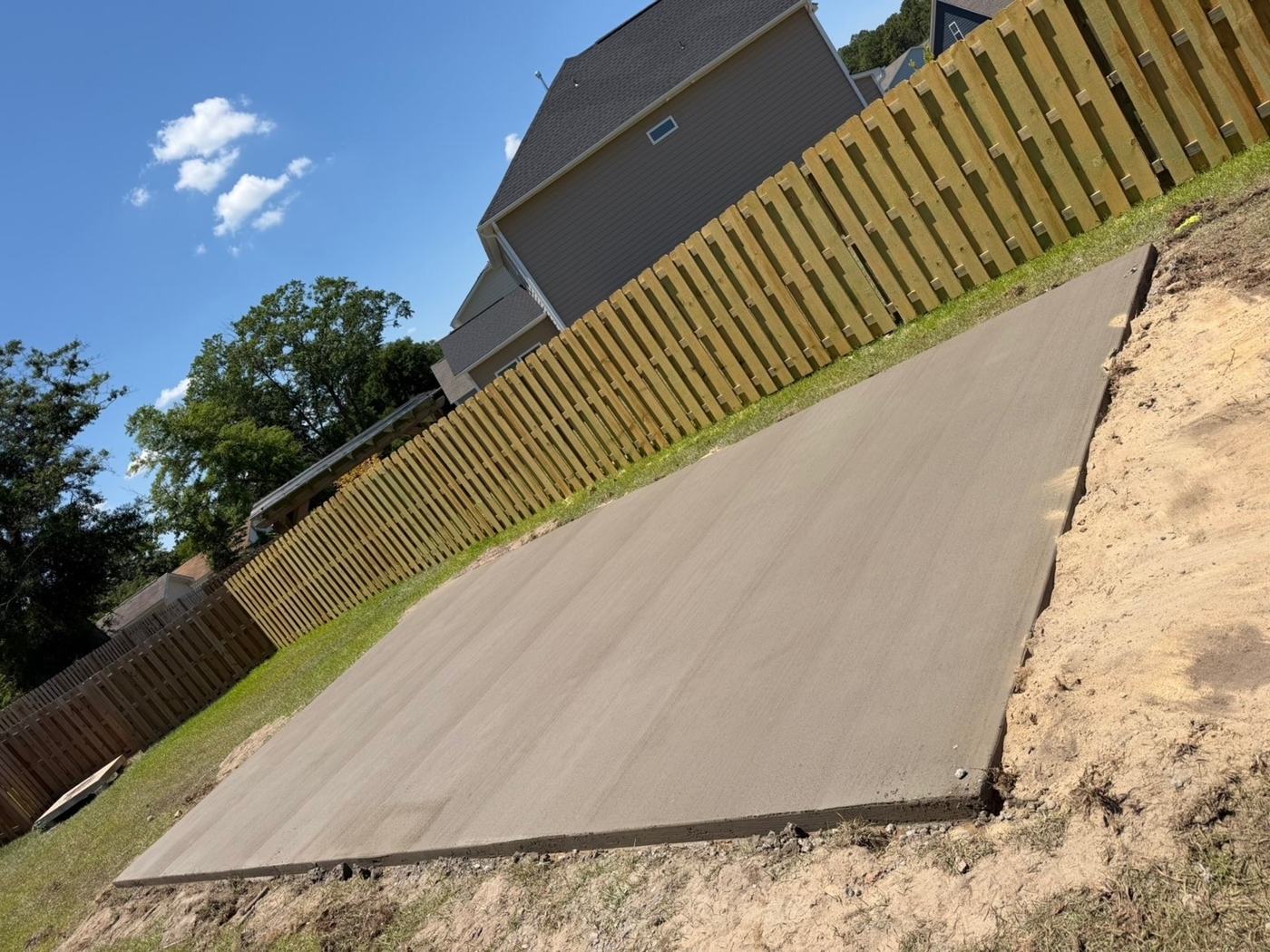 Shed pad slab — smooth finish, clean edges — Precision Palmetto, Columbia SC