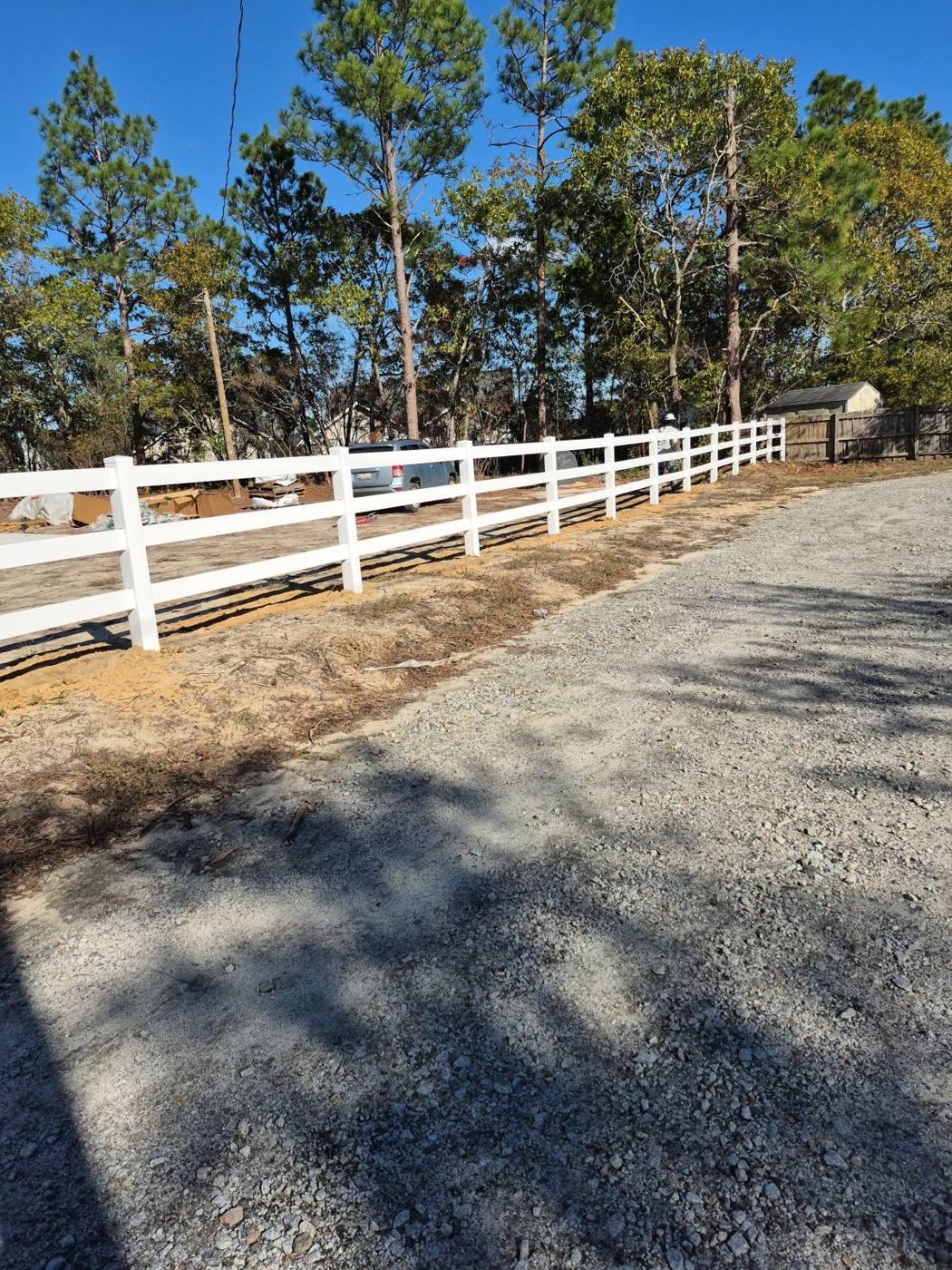 Long straight run of 3-rail vinyl — posts set true — Precision Palmetto, Columbia SC