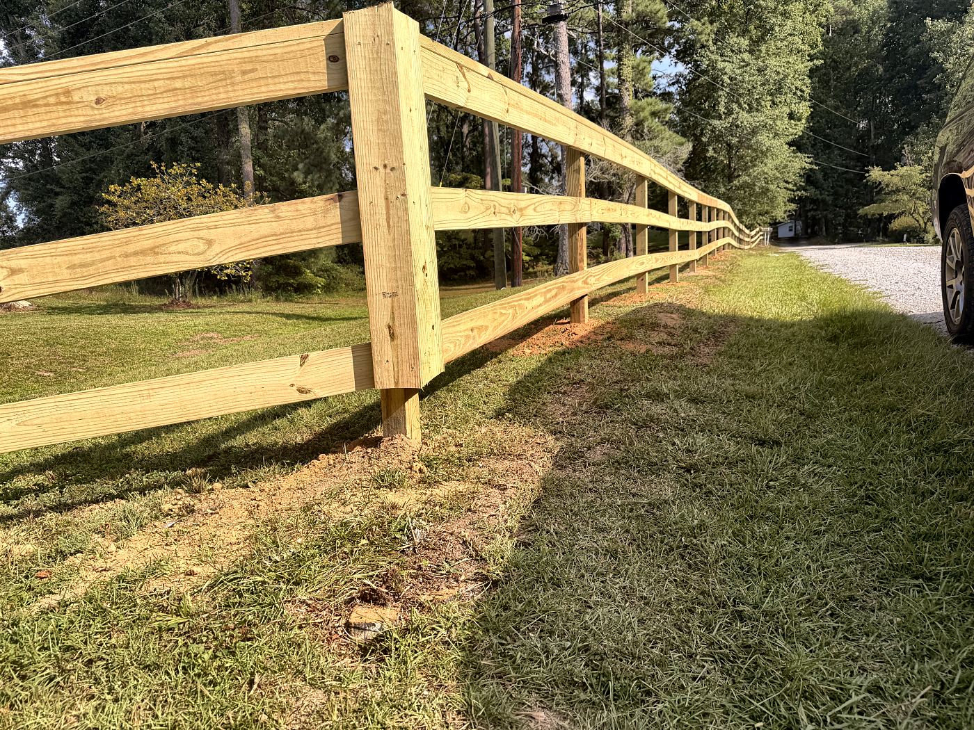Galvanized wire farm gate hung between split rail fence posts in West Columbia, SC — Precision Palmetto