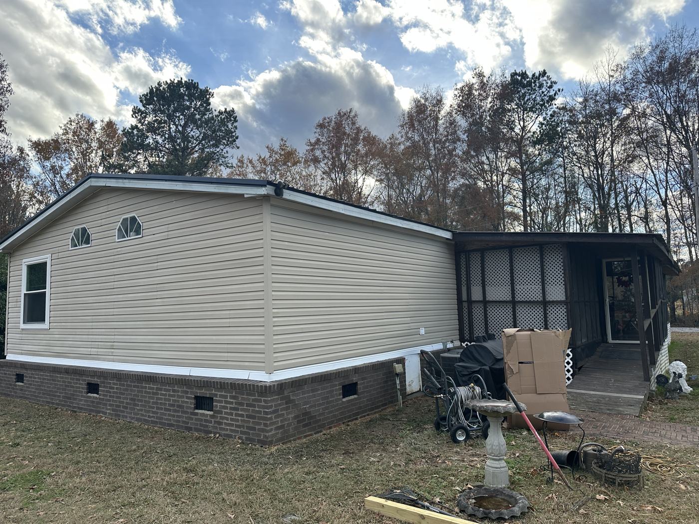 Brick underpinning tied in at the screened porch — Precision Palmetto, Columbia SC